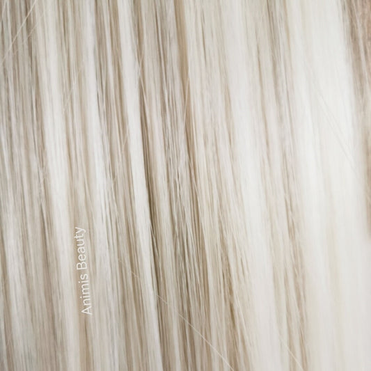 Coada par Blond platinat dreapta, cu suvita laterala